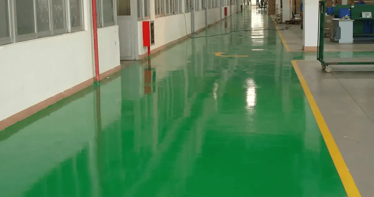 A factory floor professionally covered and marked with epoxy flooring in Aurora, CO